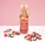 Bote dulce relleno con mensaje personalizado